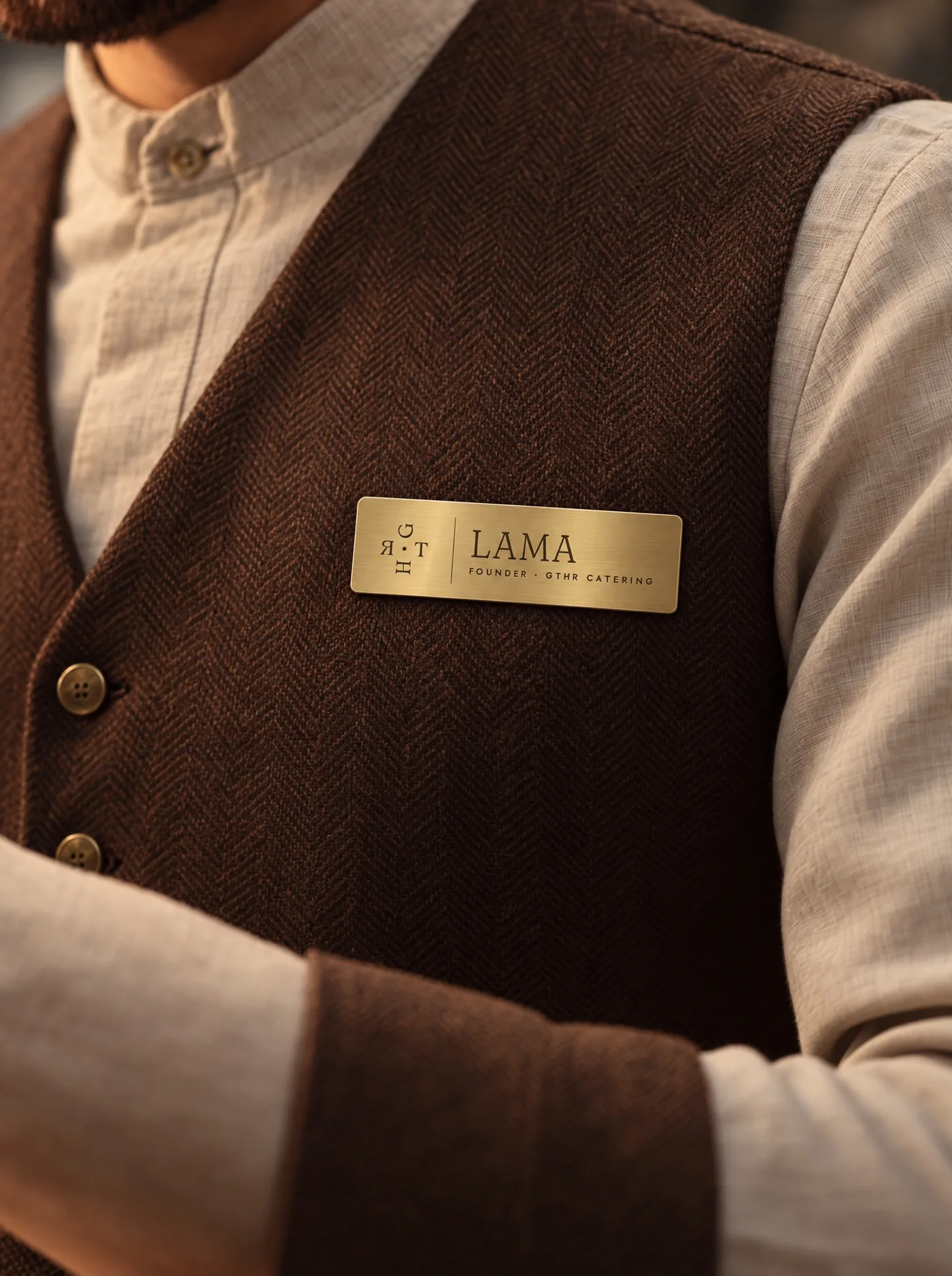 Walnut waistcoat with the brass name badge
