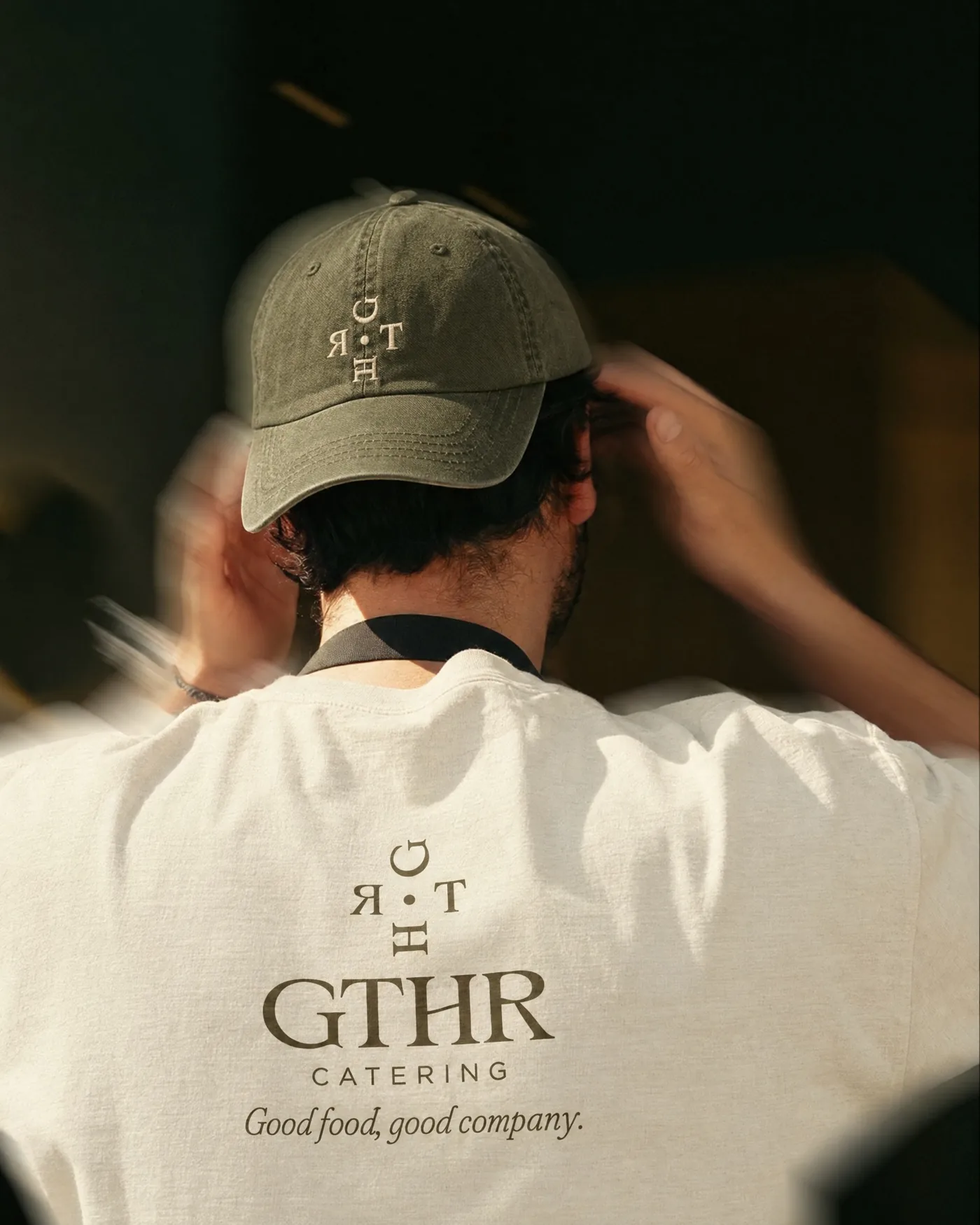 Crew cap and tee seen from behind