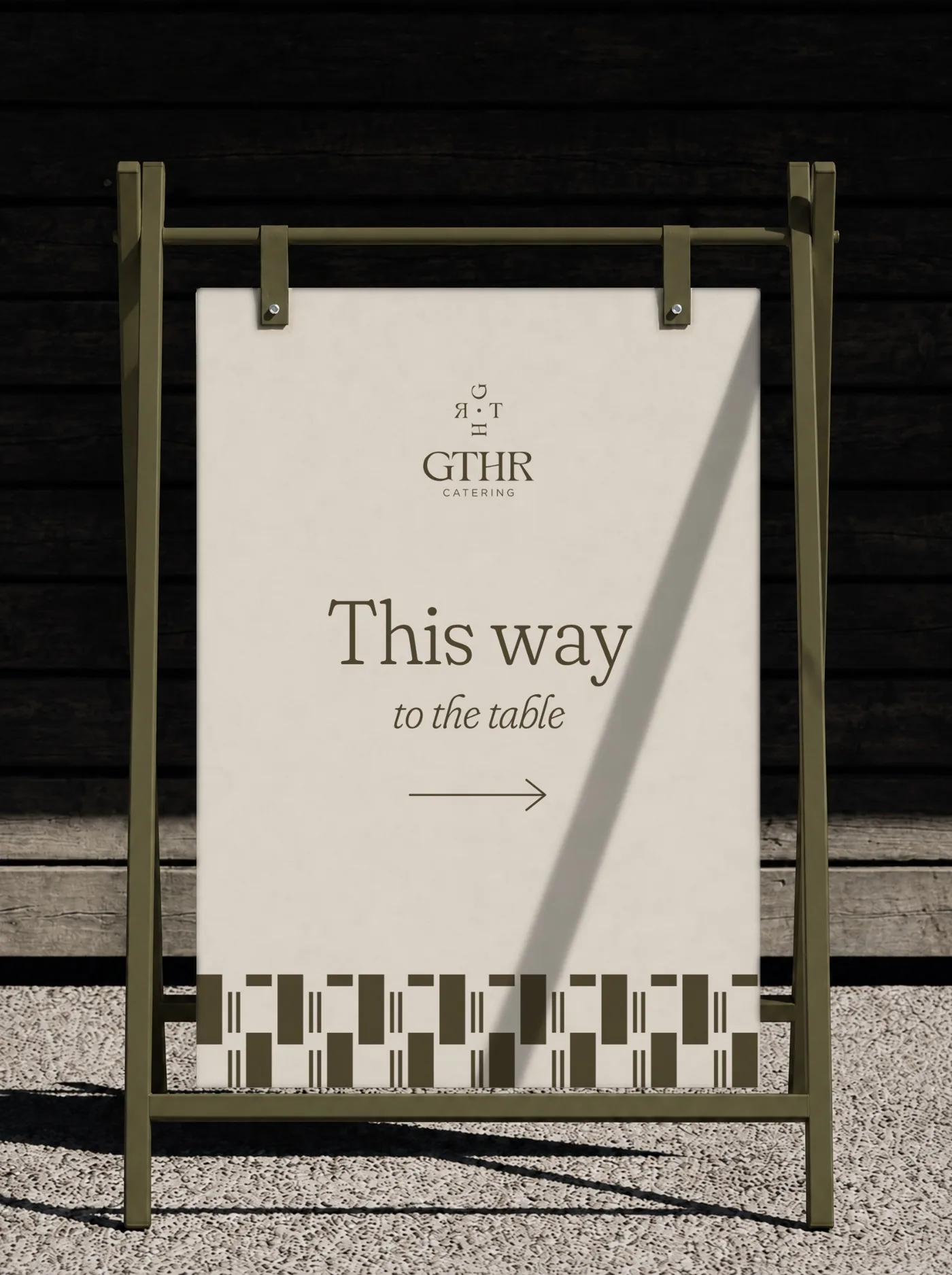 Linen wayfinding sign with an arrow, in an olive frame